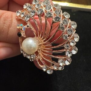 Elegant Gold and Silver Crystal Peacock Brooch